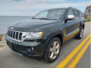 used 2011 Jeep Grand Cherokee used cars Marthas Vineyard McCurdy Motorcars quality used cars Marthas Vineyard,  MA. Certified used Volvos, used, Jeeps, used Mercedes Benz, used Toyotas, used SUVs on Marthas Vineyard in Vineyard Haven, Massachusetts